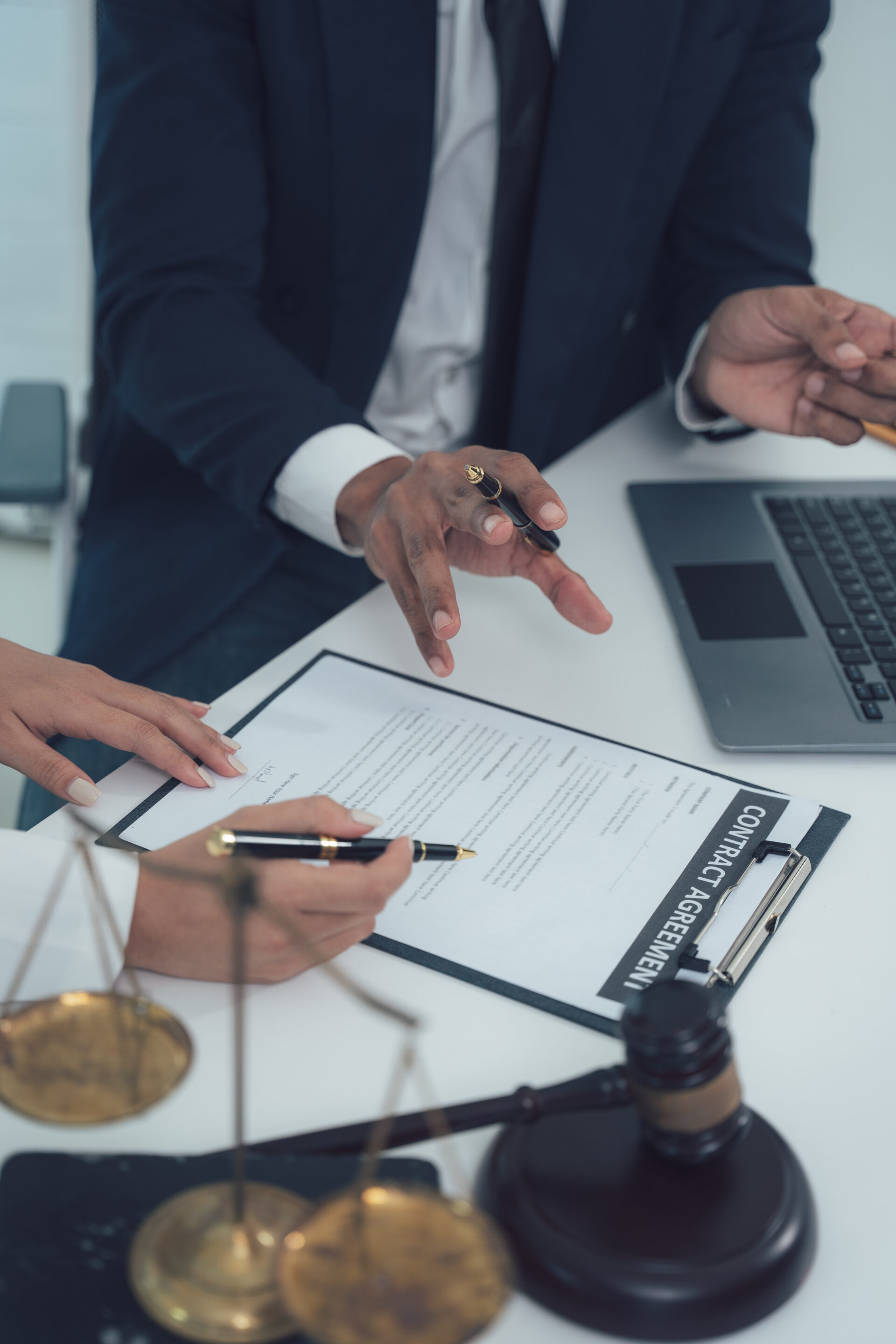 Legal Counsel Close-up shot of a lawyer reviewing a document with a client in a professional office setting The image captures the essence of legal consultation emphasizing trust confidentiality Wrongful Death in Boating Accidents