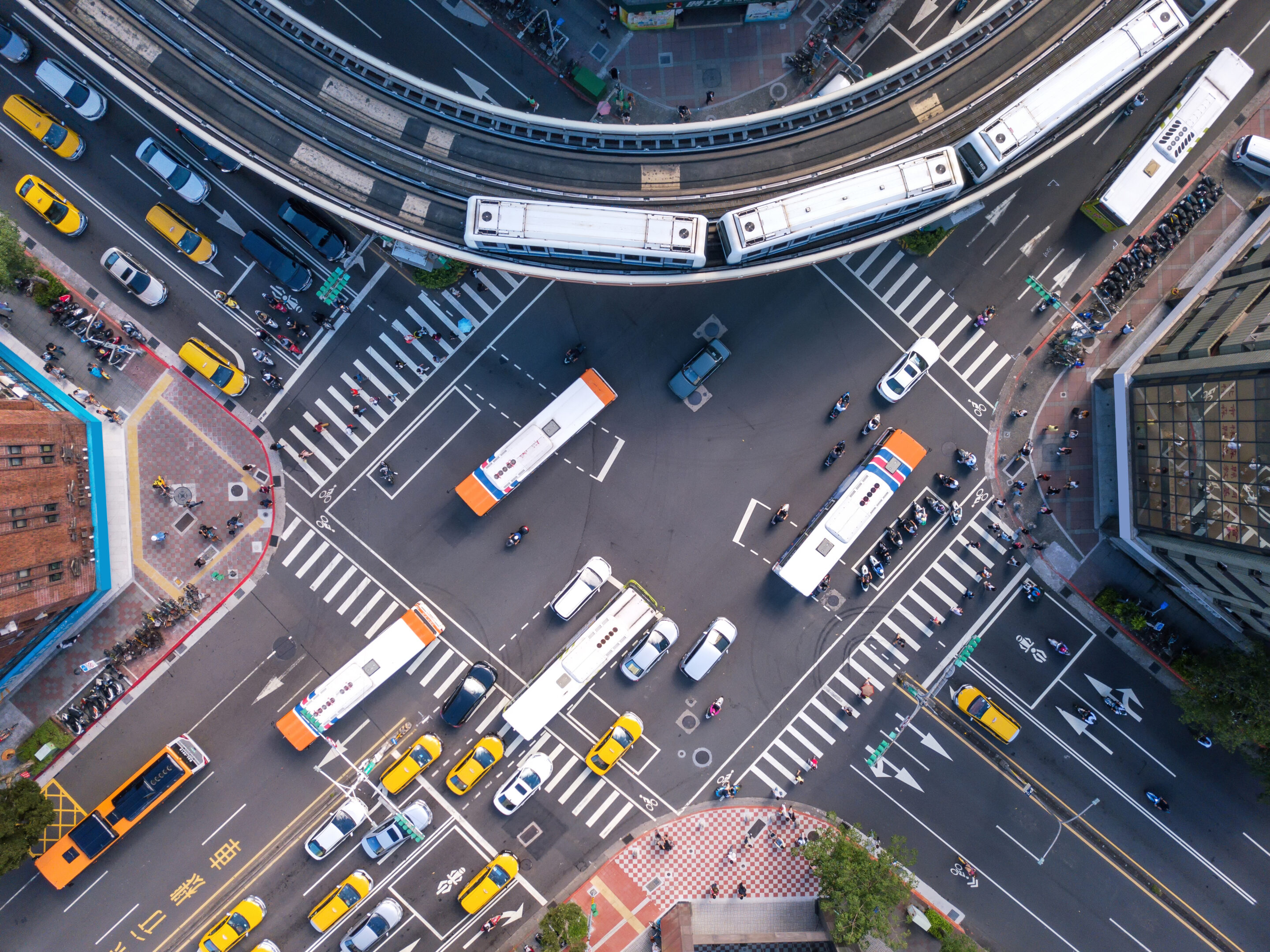 Aerial view of cars and trains with intersection or junction with traffic Taipei Downtown Taiwan Financial district and business area in transportation smart urban city technology concept