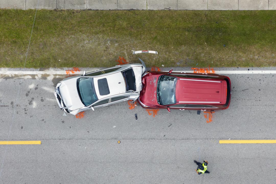 Car crash with two vehicles collided at traffic accident site on American street car accident arcadia
